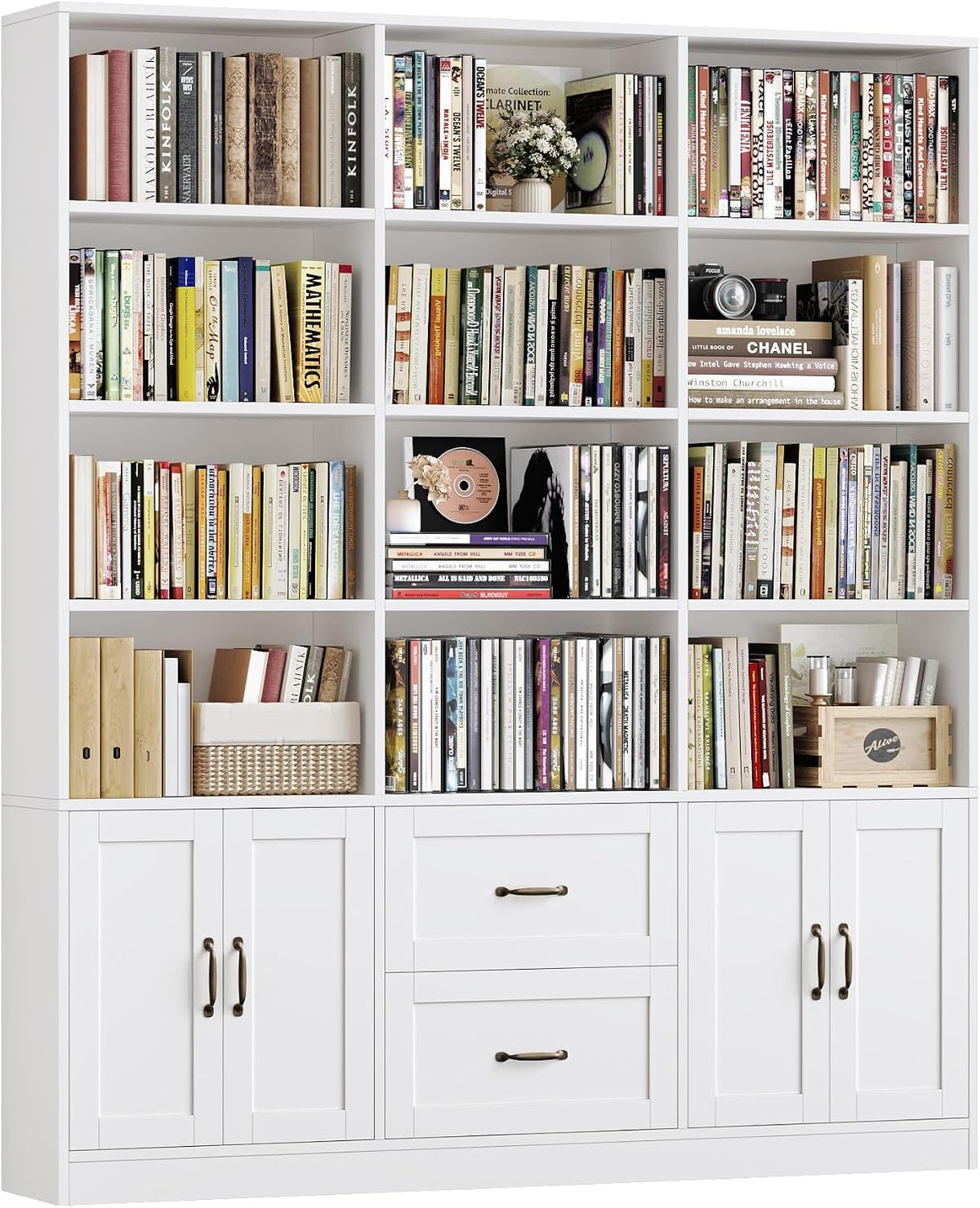 Full white triple-wide bookshelf styled with books in each cubby, central drawers and lower cabinets