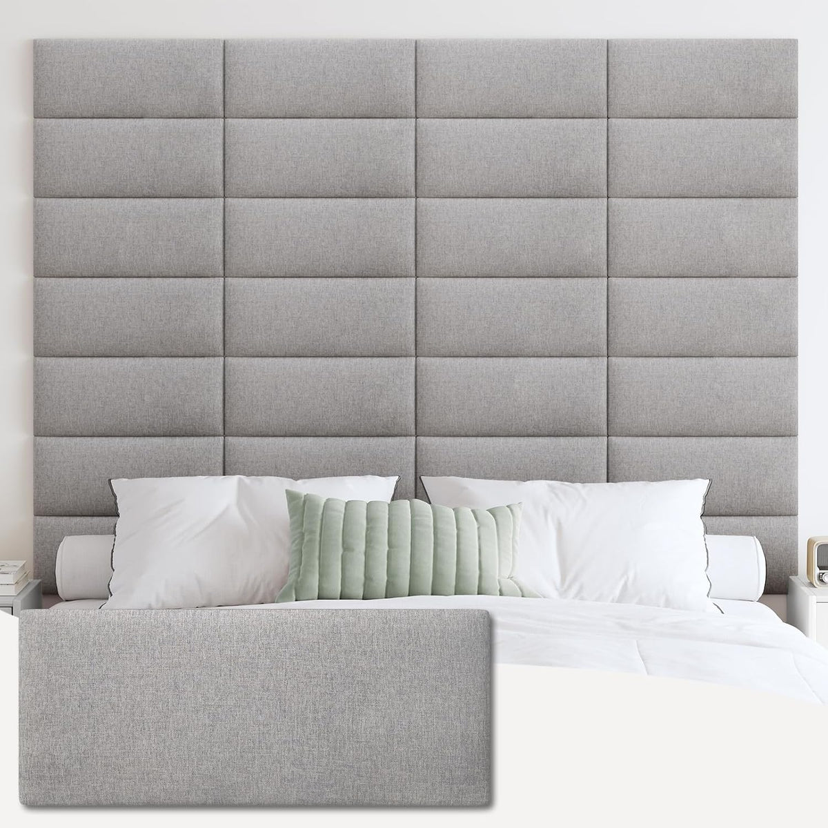 Medium gray headboard panels arranged in a grid behind a bed with pillows, close front view showing panel seams