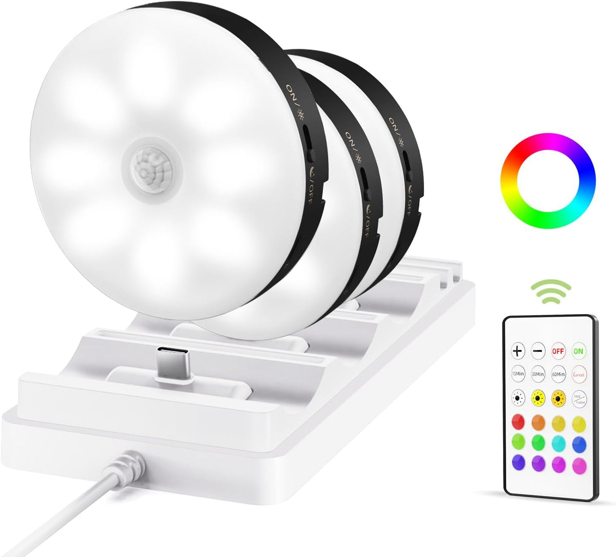 Angled close-up of three puck lights on a dock showing a black side trim option and the remote control.