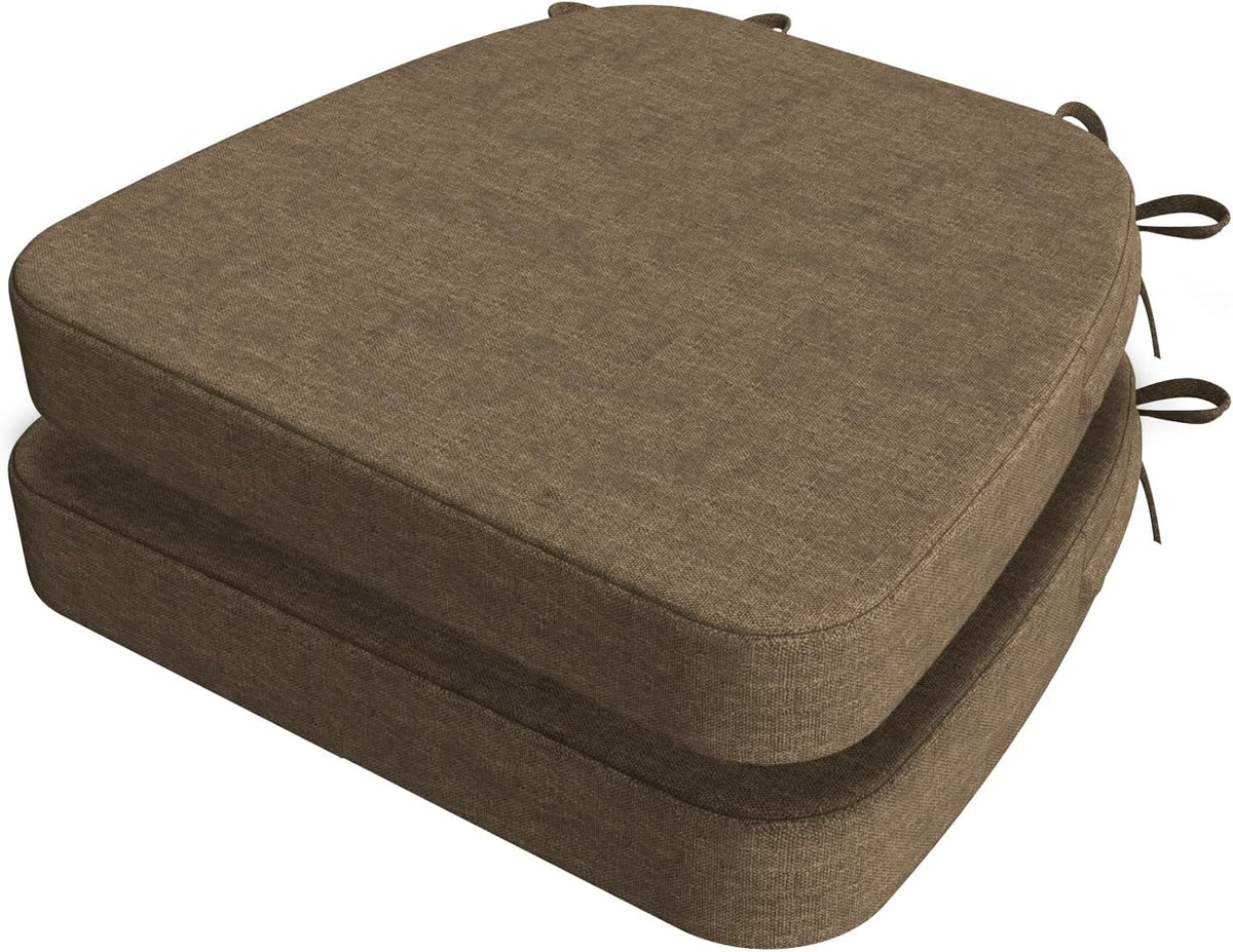 Two brown D-shaped chair cushions stacked at an angle, showing rounded front edges and tie loops.