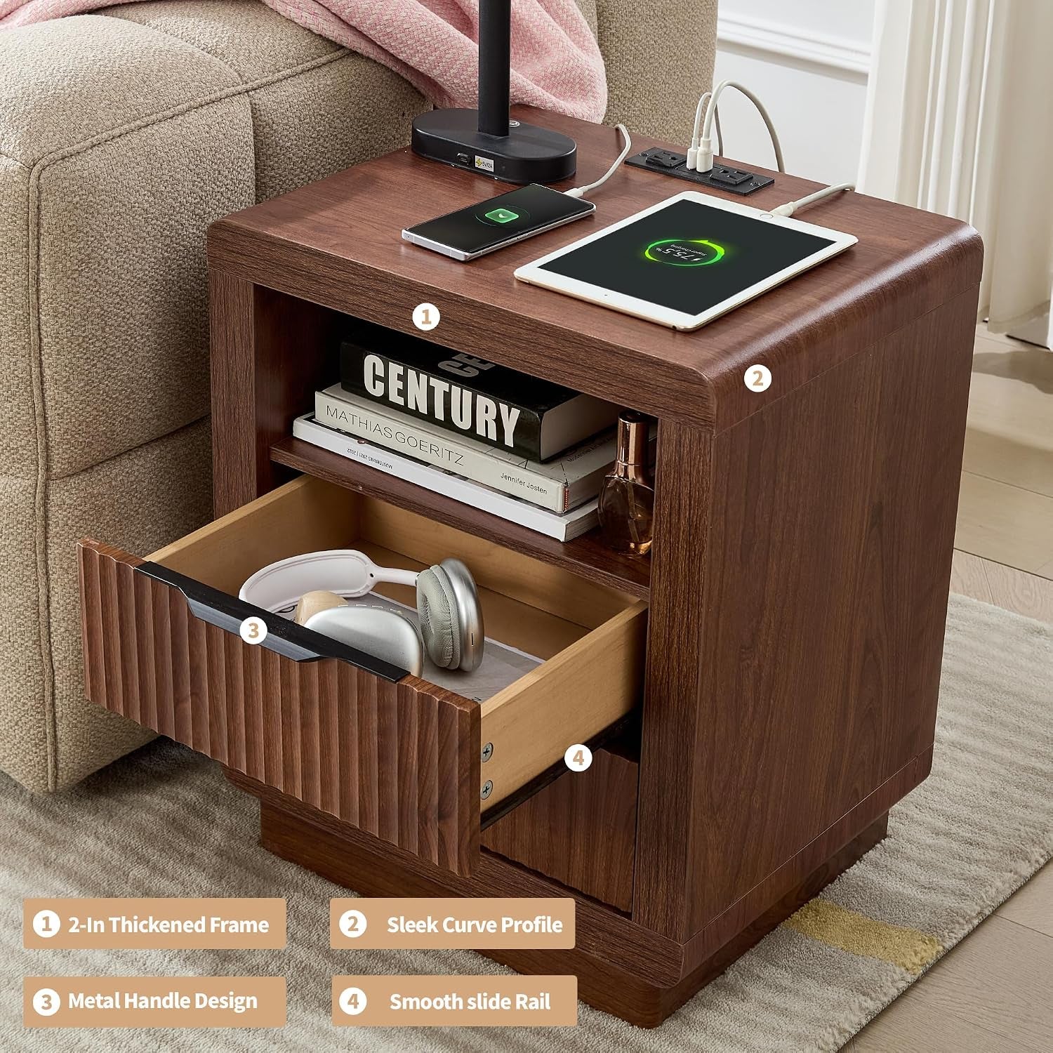 Top-down angle showing charging station on tabletop and an open drawer with headphones inside