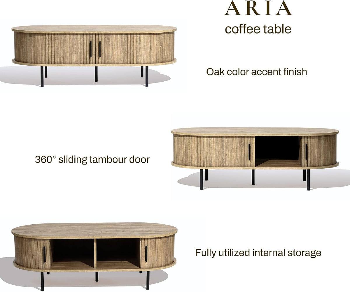 Studio views of the oak-grain oval table showing closed tambour doors, metal legs, and an open storage view