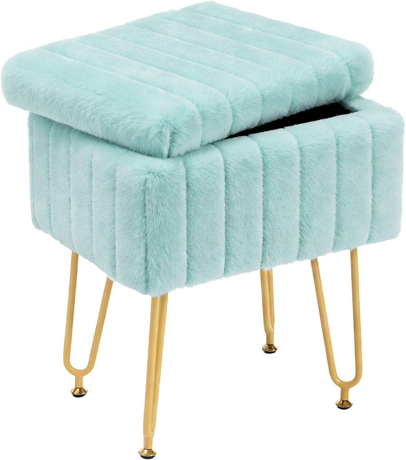 Mint faux-fur rectangular ottoman with vertically tufted sides, slightly open lid and gold metal legs.