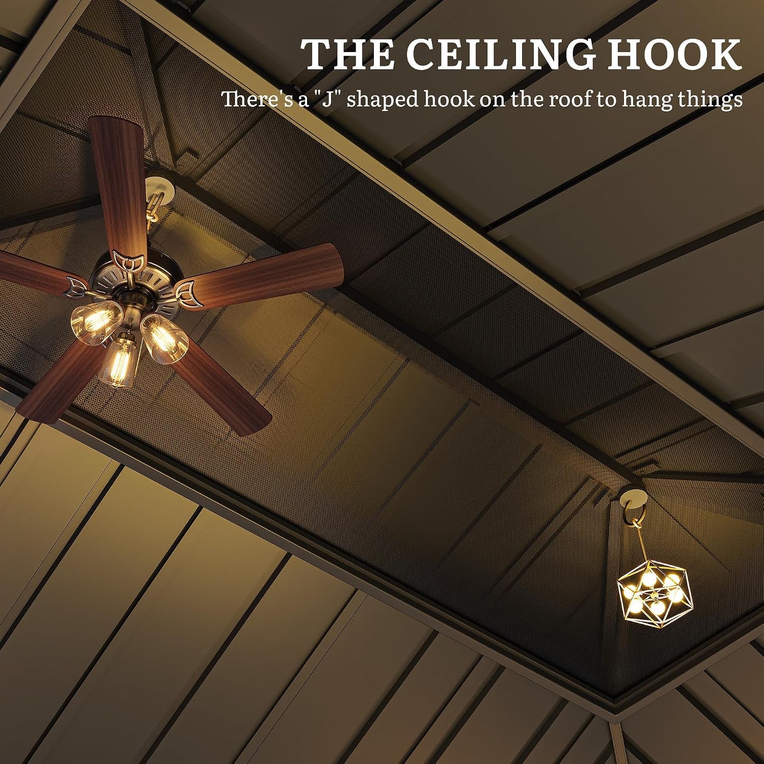 Upward view of the gazebo's dark double roof interior showing a wood-blade ceiling fan and a hanging geometric pendant light.