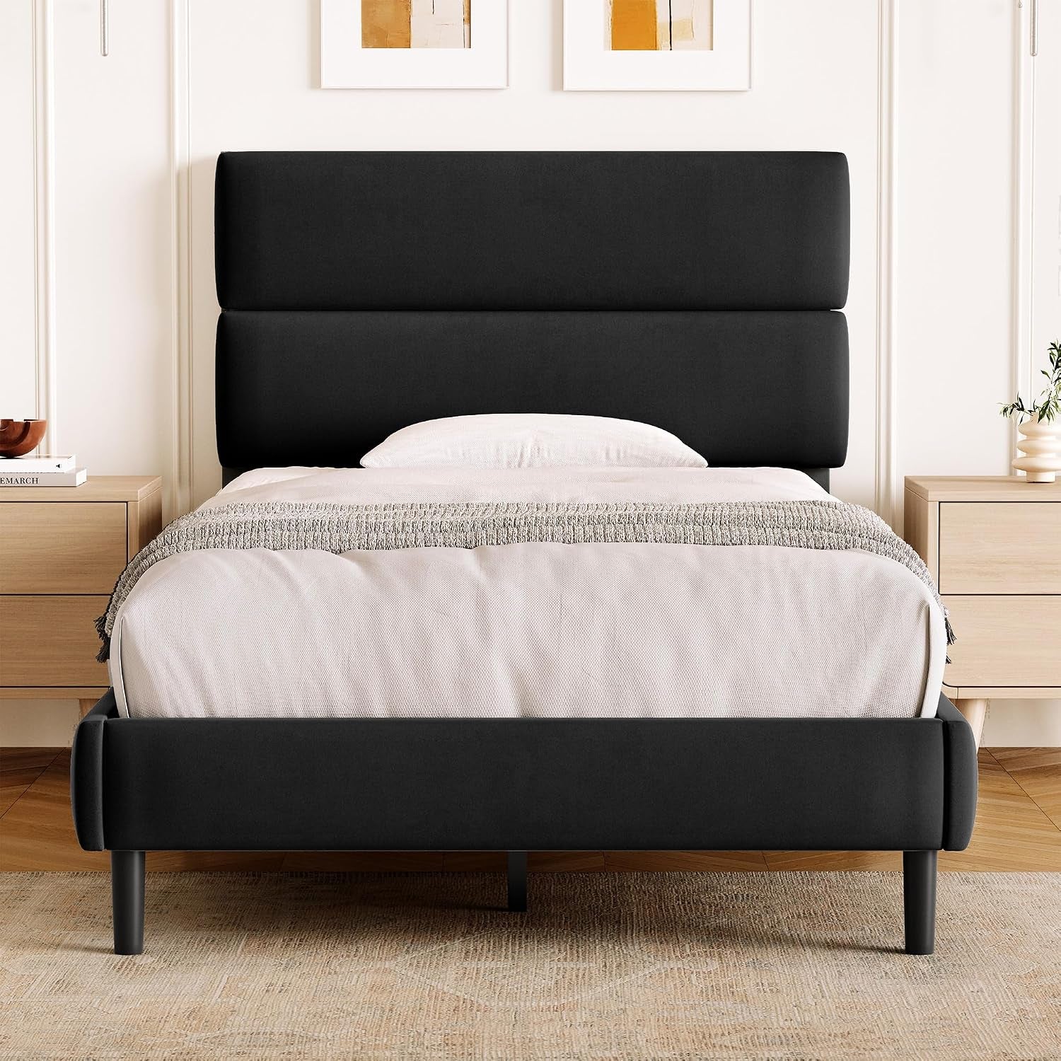 Compact front view of a black upholstered platform bed with two stacked headboard panels.