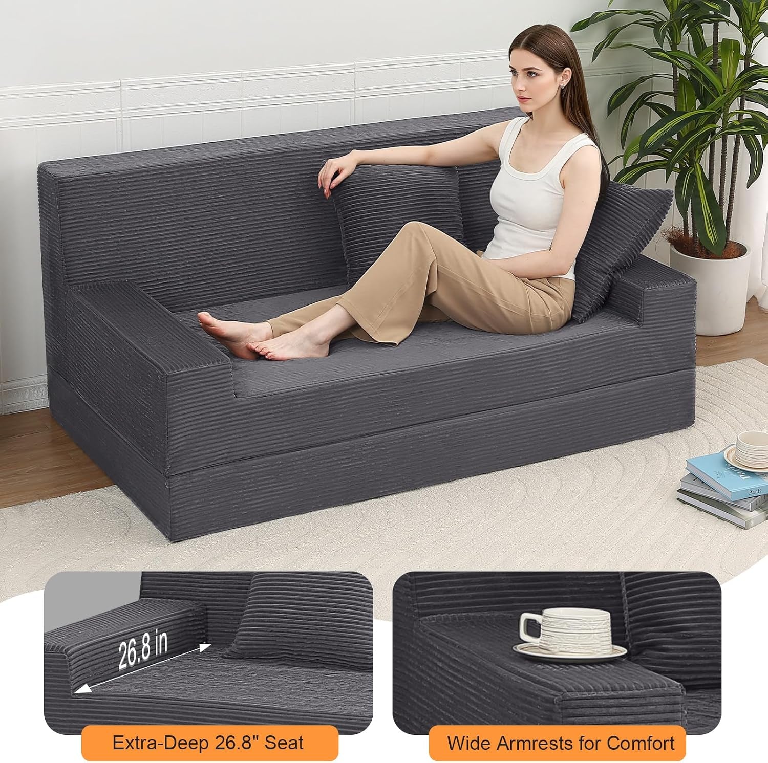 Dark grey futon loveseat angled side view highlighting extra-deep 26.8 in seat and wide armrests