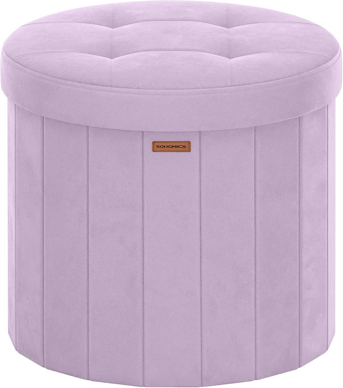 Front-facing studio shot of a round lavender velvet storage ottoman with tufted lid.