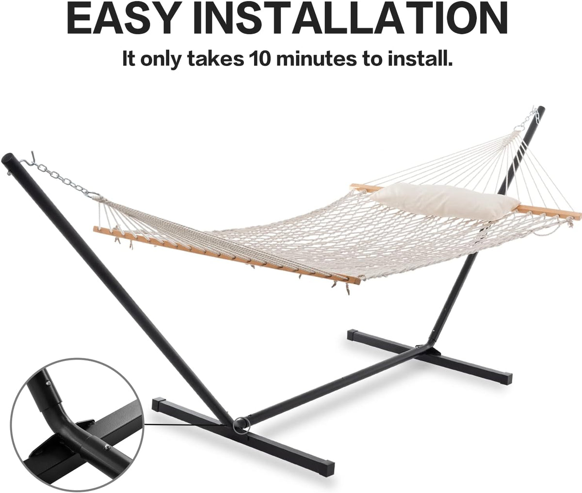 Natural rope hammock with hardwood spreader bars mounted on a black steel stand, studio view showing stand connection