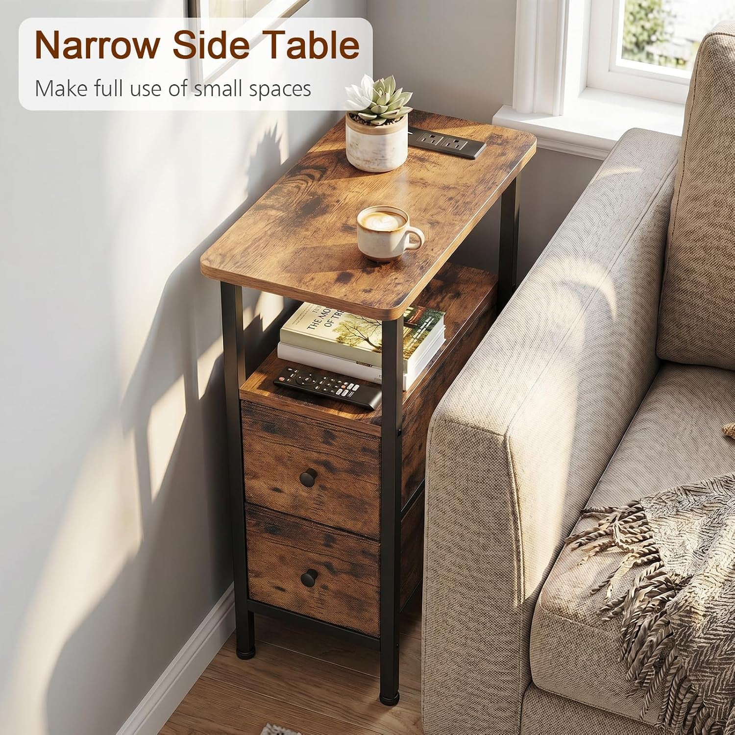 Narrow side table tucked beside a sofa with books and a remote on the middle shelf and a cup on top.