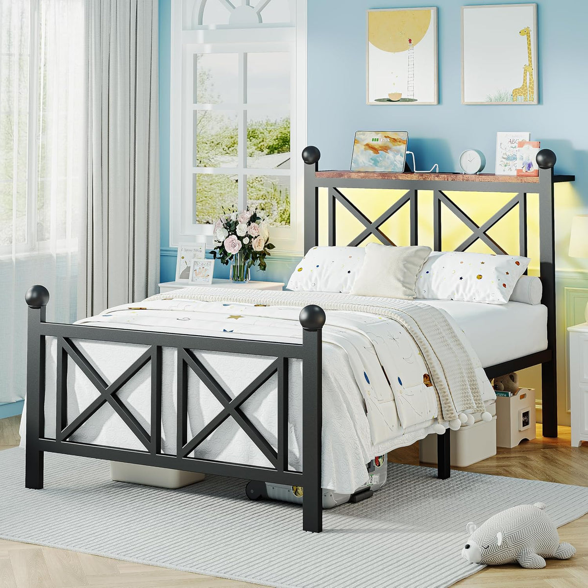 Angled side view of black platform bed with illuminated headboard shelf in a styled children's bedroom