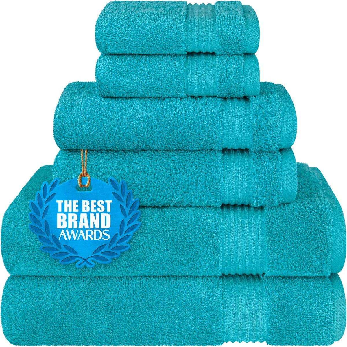 Front view of bright teal towels stacked, showing ribbed bands and a blue award medallion