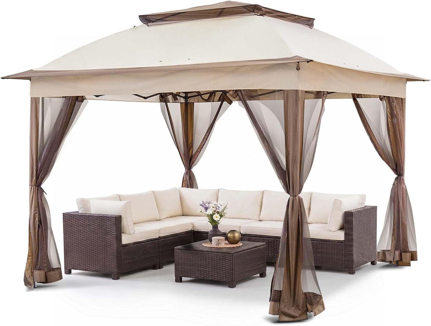 Beige 11x11 pop-up gazebo with tied-back mesh sidewalls over wicker sectional, angled front view