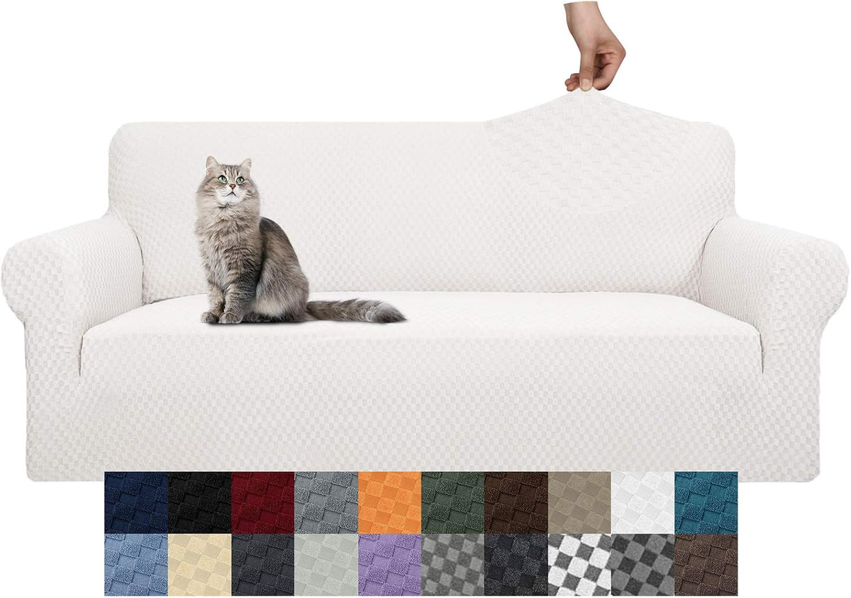 Front view of a white stretch sofa cover on a three-seat couch with a cat sitting on the left seat
