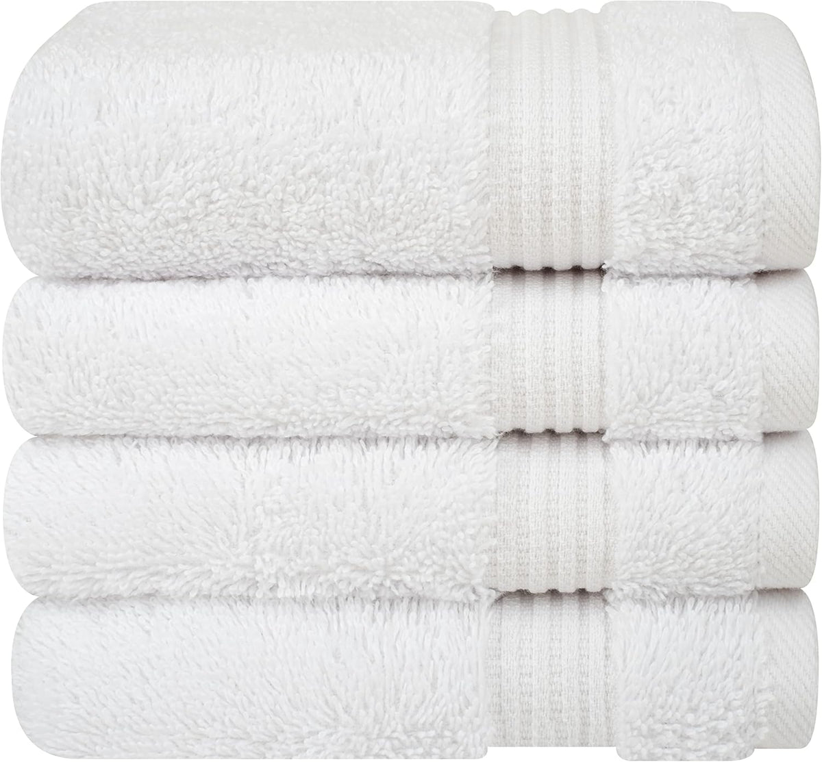 Front-facing stack of four white towels showing plush loops and ribbed trim