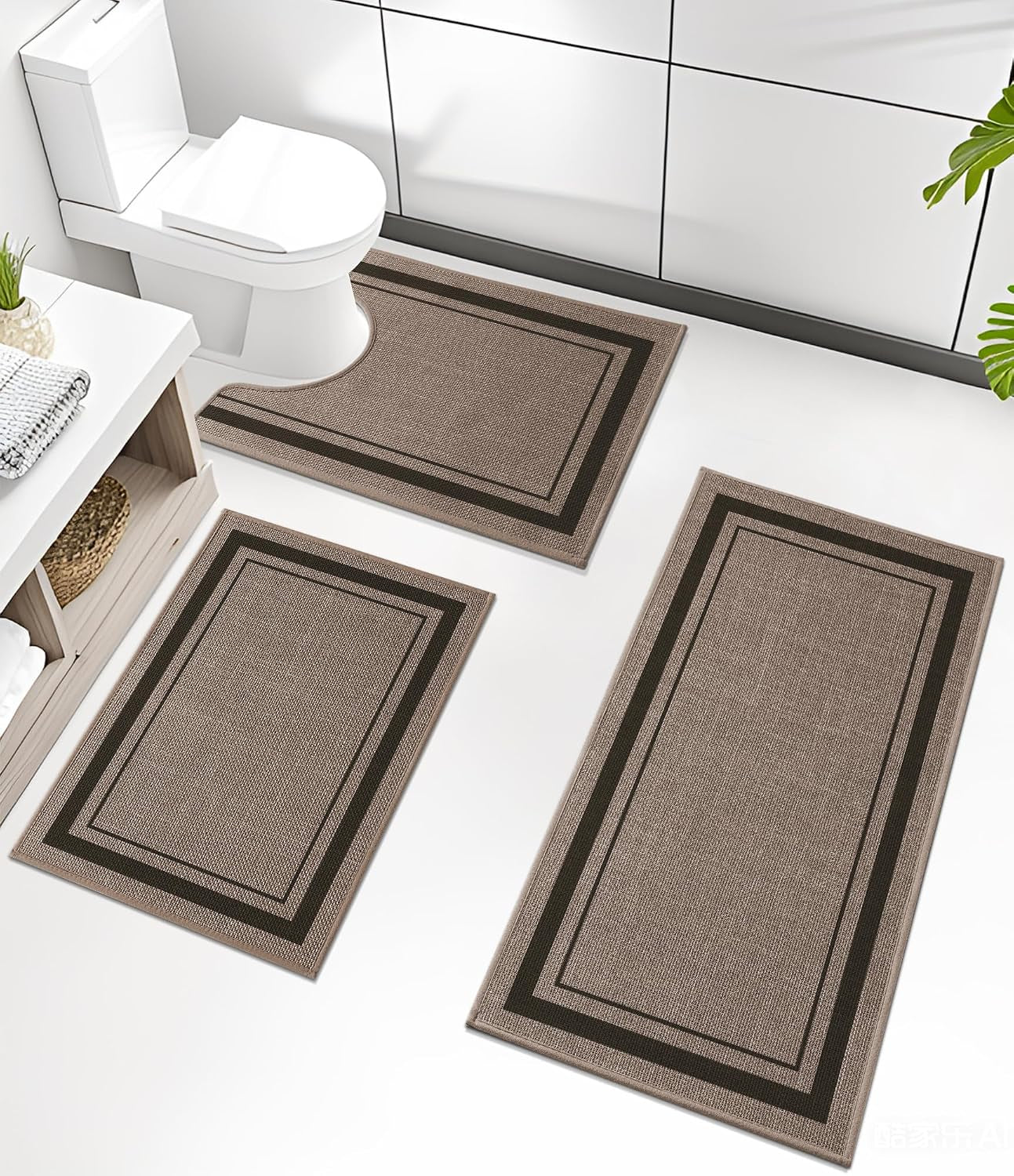 Three matching beige bath rugs arranged in a bathroom around a toilet and vanity.