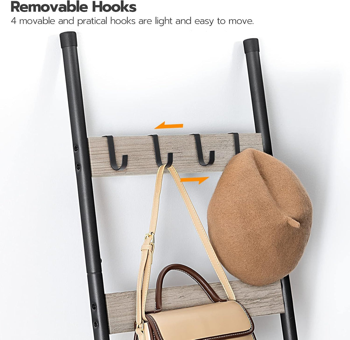 Close-up of the top slat with four movable black hooks and a tan beret hanging on one hook