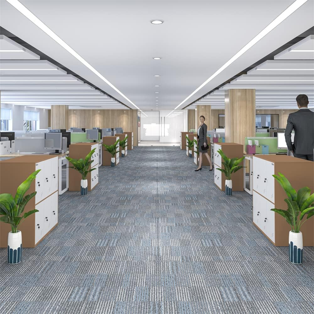 Open-plan office aisle with low brown-and-white locker units used as desk dividers down the center.