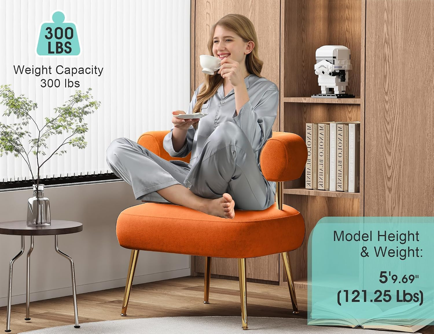 Model seated cross-legged on an orange round accent chair showing spacious seating and 300 lb capacity callout