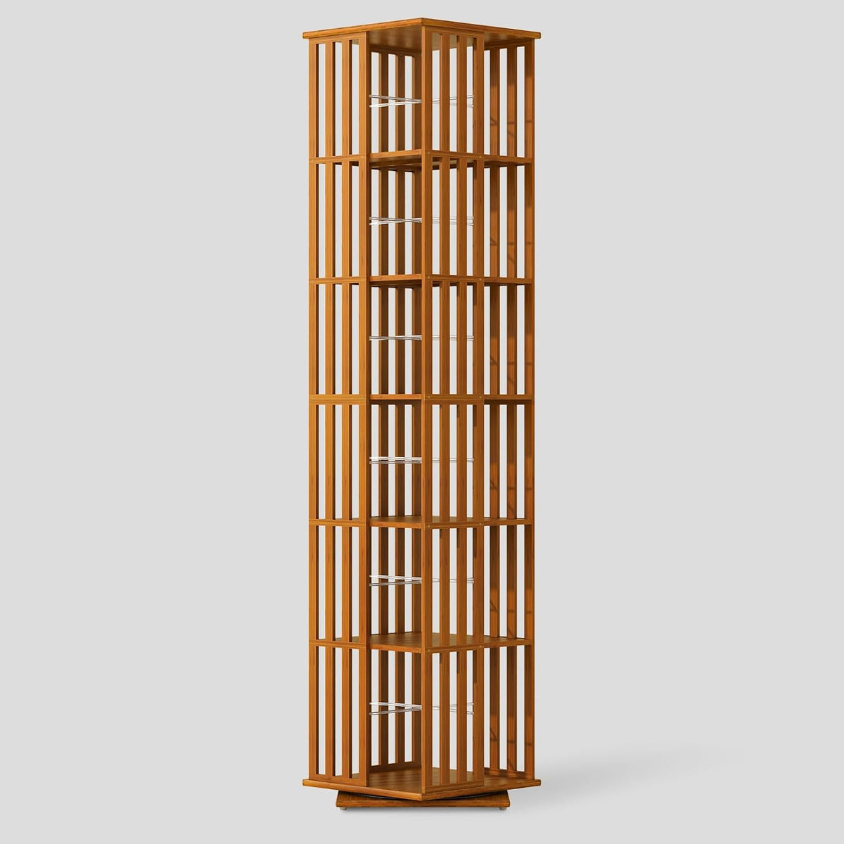 Natural bamboo rotating bookshelf tower isolated on a light grey background, front view