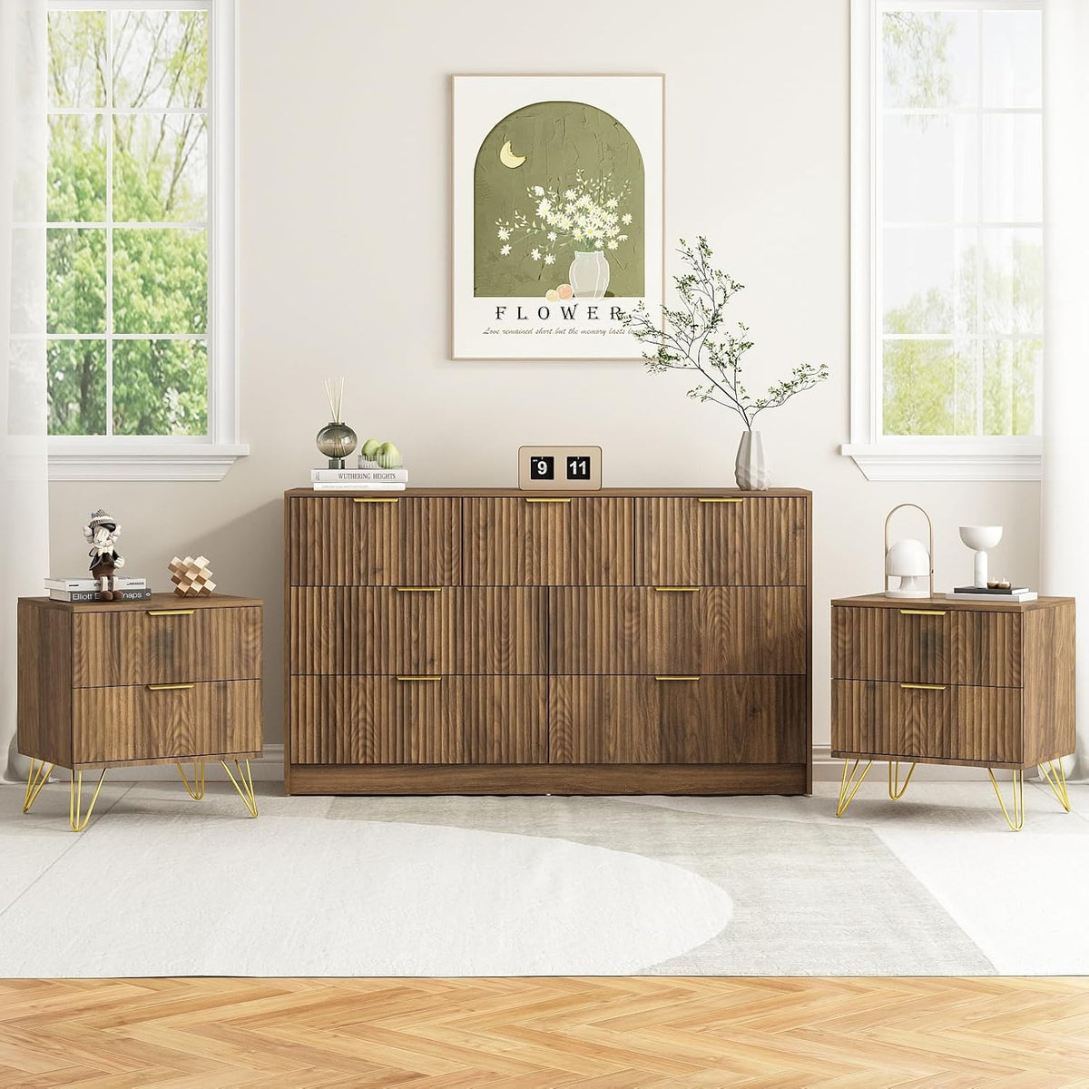 Walnut fluted three-piece dresser with two matching nightstands front view in a bright room with windows