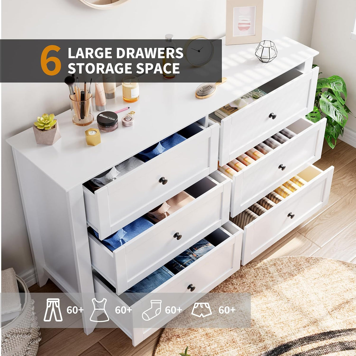 Overhead angled shot of the dresser with multiple drawers open displaying folded clothes and storage capacity