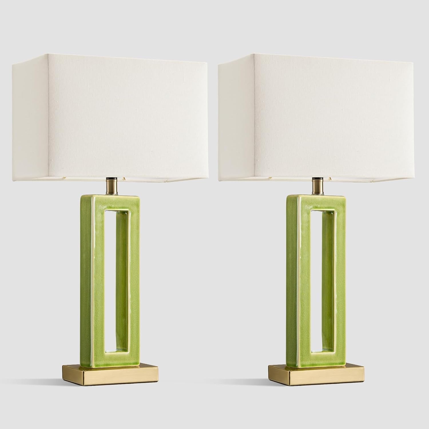 Pair of green rectangular hollow ceramic table lamps with white rectangular shades on gold bases
