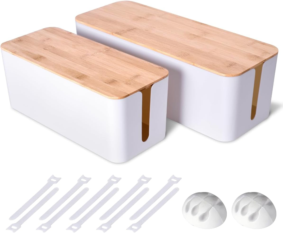 Two white cable management boxes with bamboo-style lids shown at an angle with cable ties and adhesive clips in front