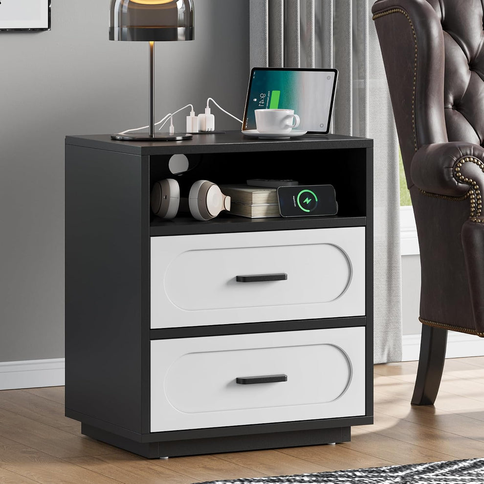 Black and white 2-drawer nightstand angled front view with lamp and tablet on top