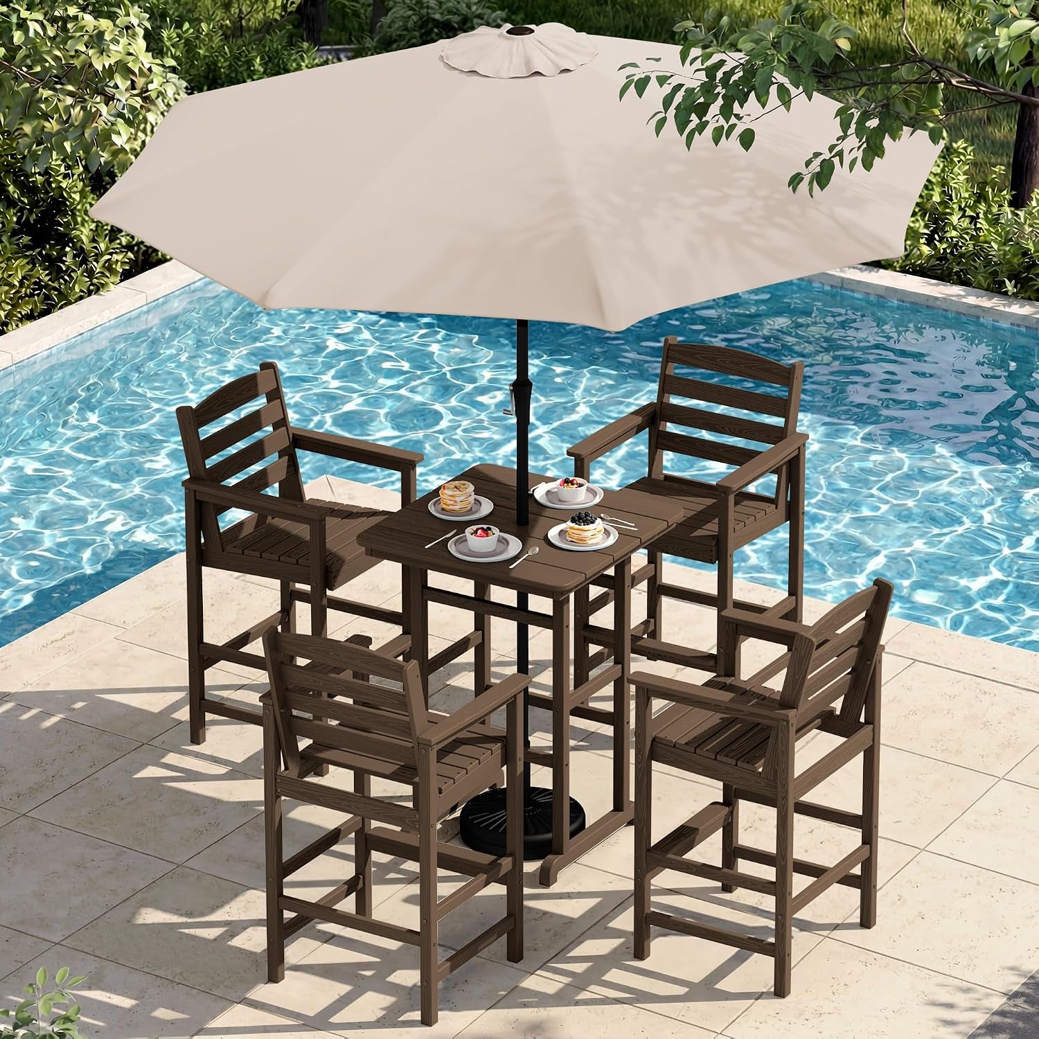 Four brown bar-height chairs around a square table with umbrella over a poolside patio.