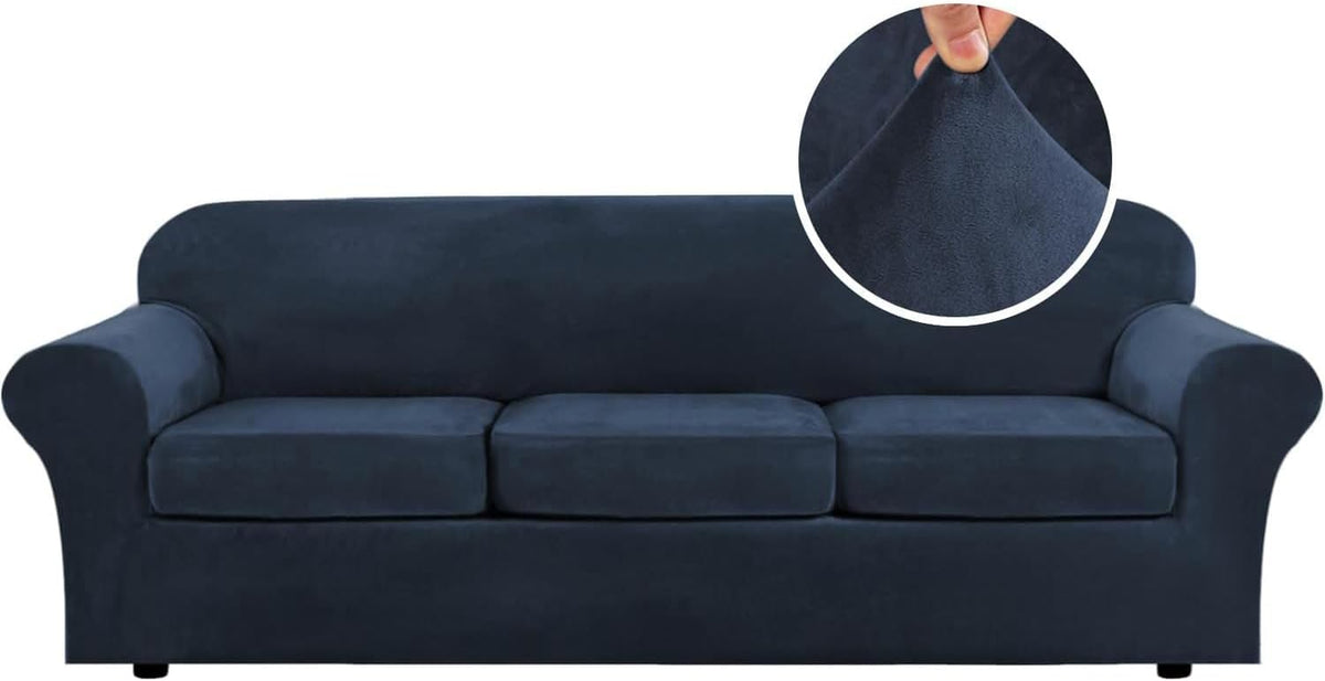 Front view of a dark navy three-seat sofa covered in a velvet-like stretch slipcover with circular fabric close-up.