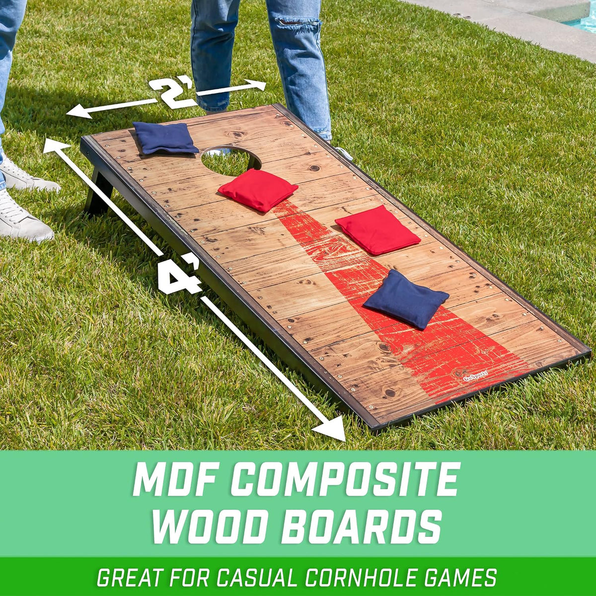 Single cornhole board on grass with red and blue bean bags and arrows indicating 4' by 2' layout