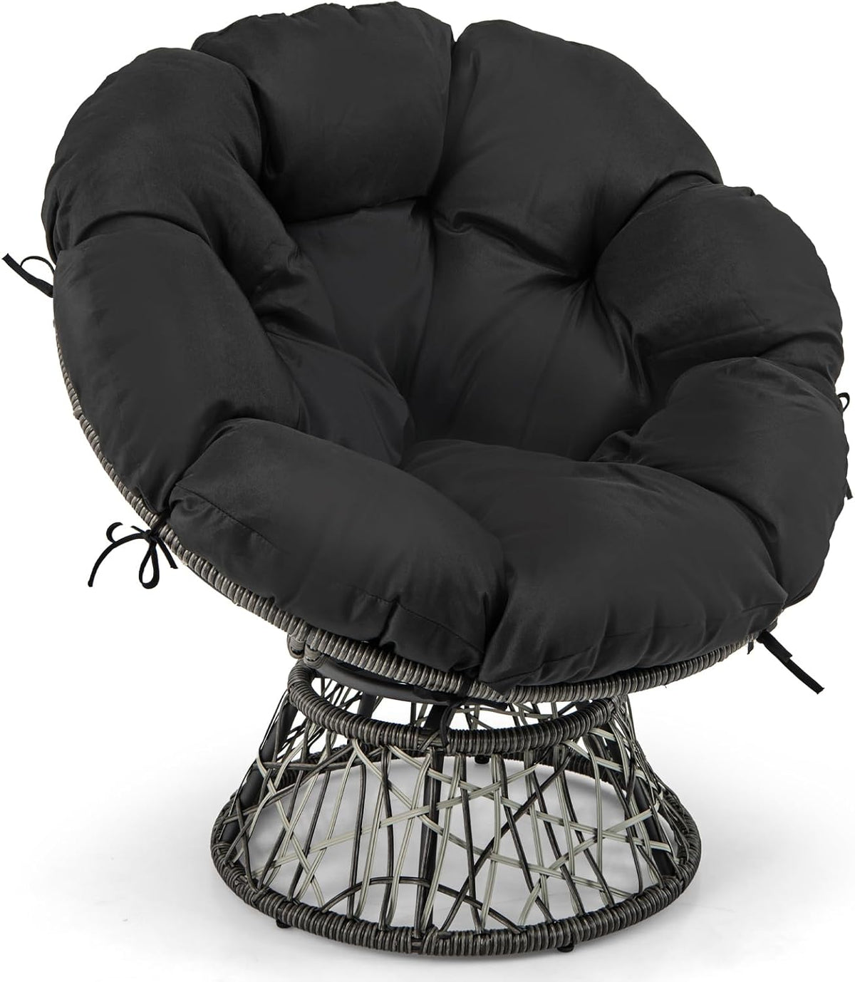Close-up of the black tufted cushion and woven rattan base seen from above.