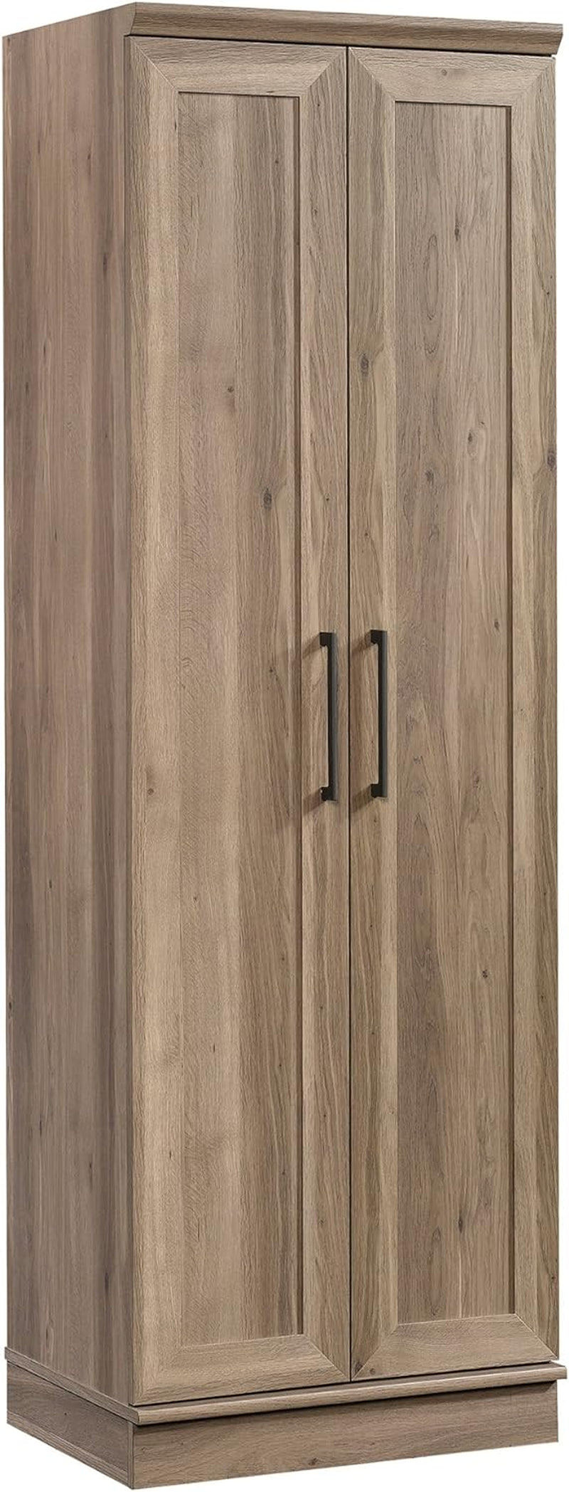 Tall two-door storage cabinet in a light brown wood grain finish with dark metal handles.
