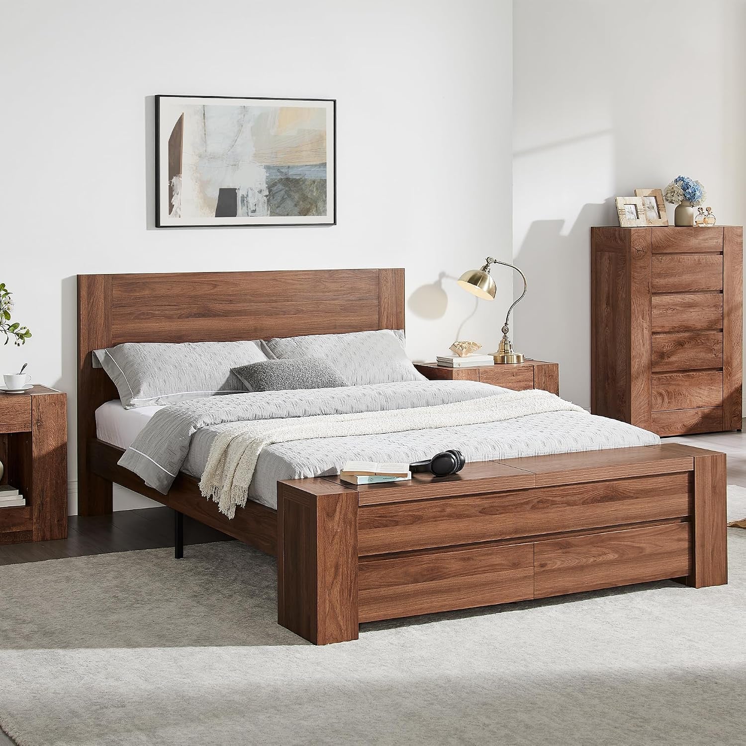 Front view of a walnut-finish platform bed with storage bench at foot in a neutral bedroom scene.