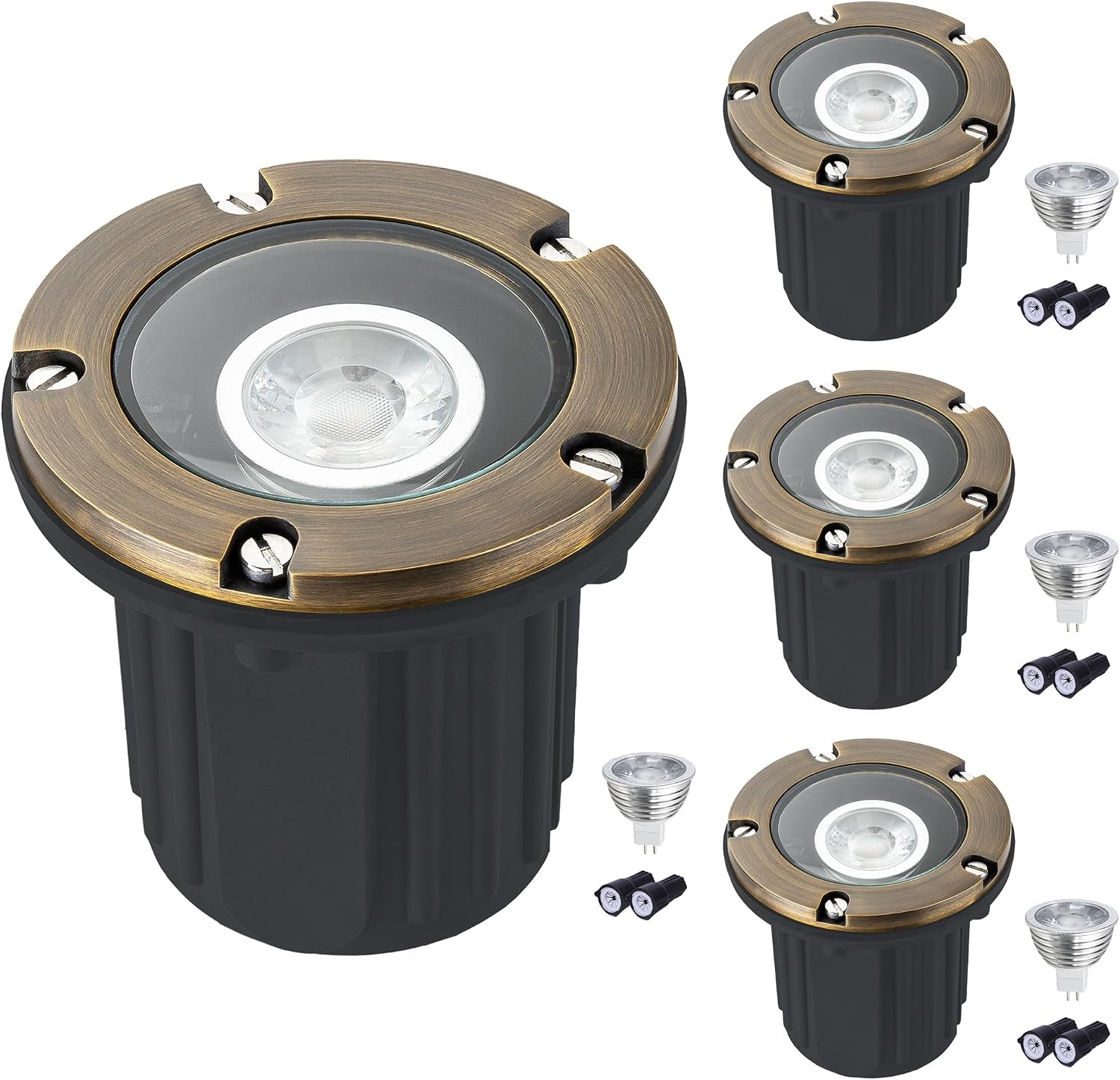Studio group shot of three brass-top in-ground fixtures with matching MR16 bulbs and plug connectors on a white background.