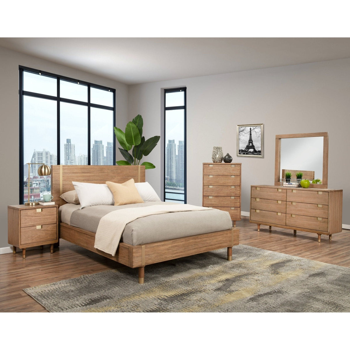 Wood platform bed in a modern bedroom with a matching dresser, chest, and nightstand