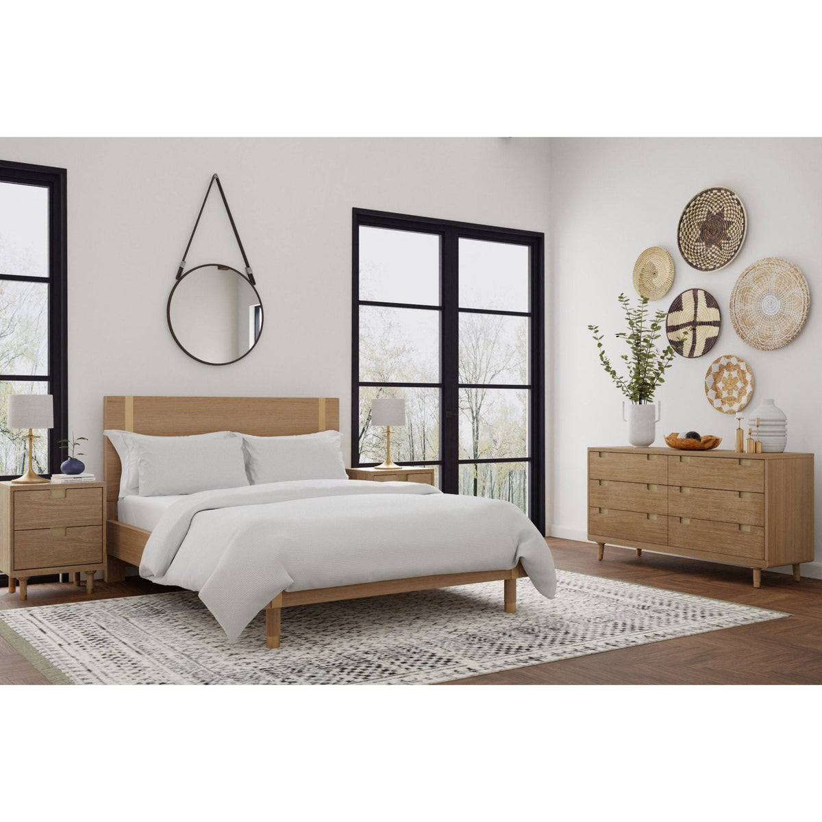 Wood platform bed in a bright bedroom, shown with matching nightstands and dresser