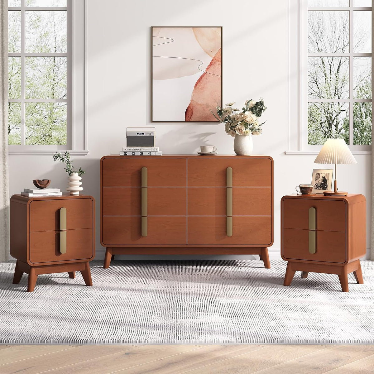 Bedroom grouping with two matching square nightstands flanking a wide dresser in warm wood