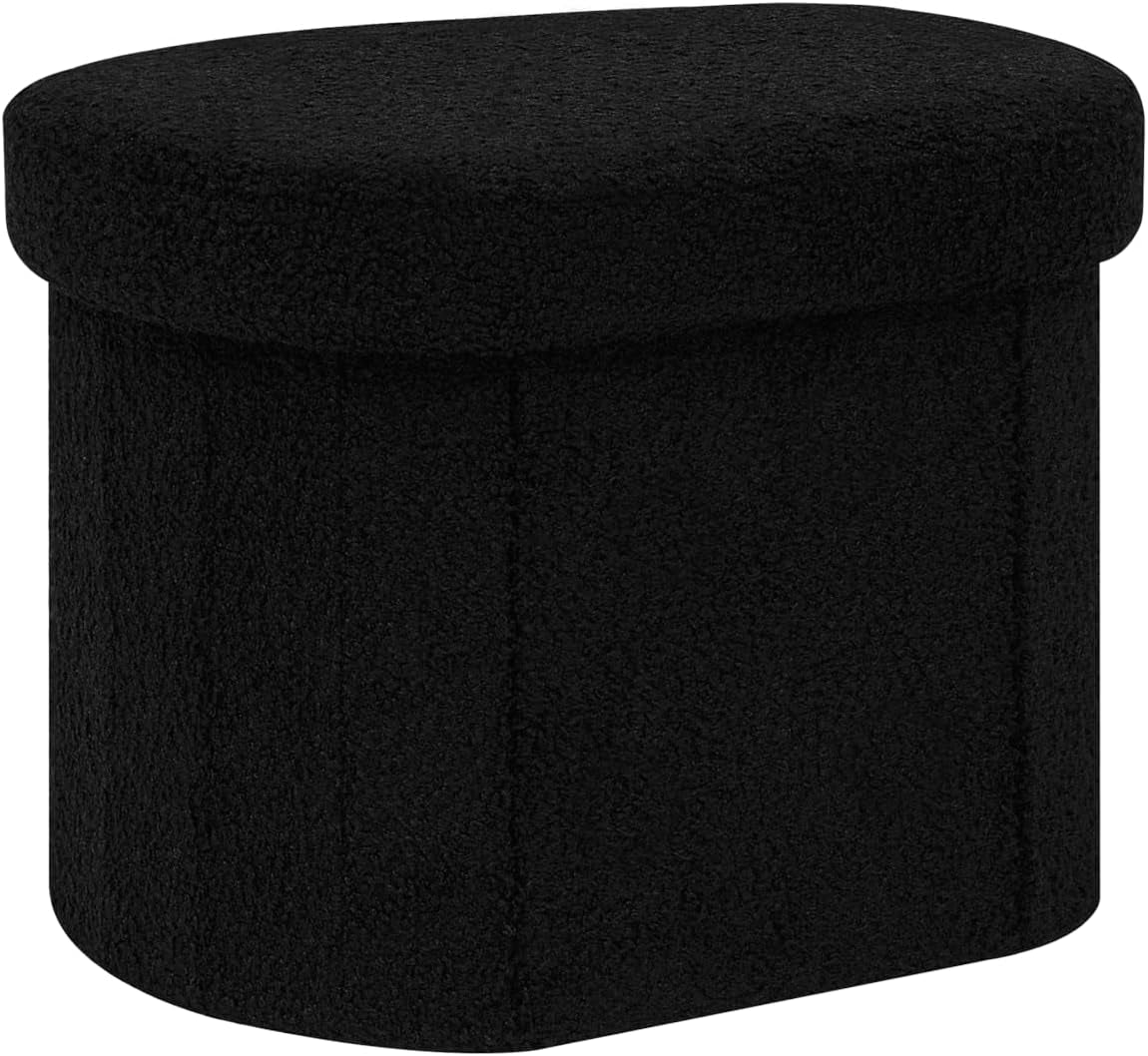 Rounded rectangular storage ottoman in black sherpa fabric, presented on a white background.