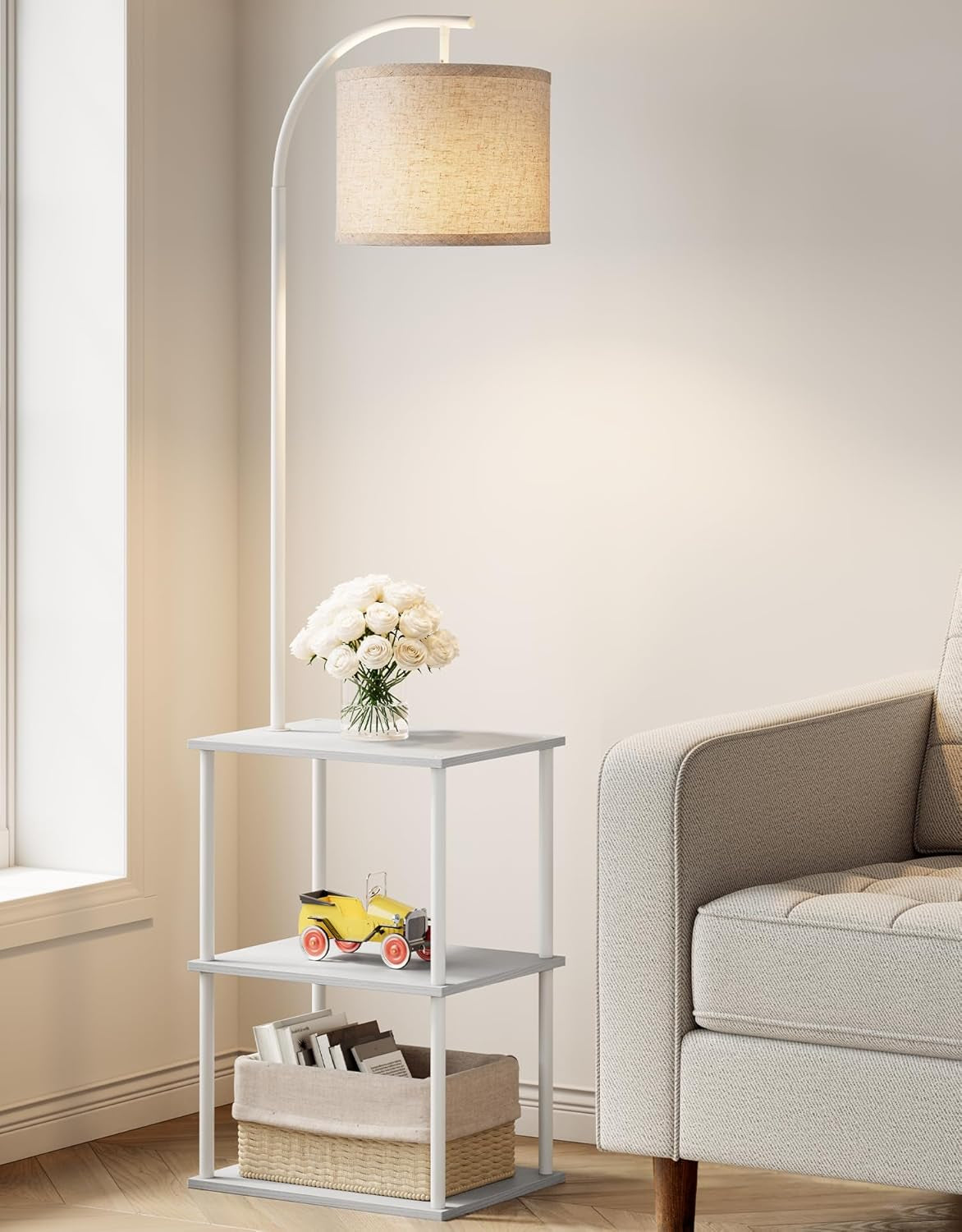 Bright corner with the lamp table in a white finish next to a light upholstered chair.