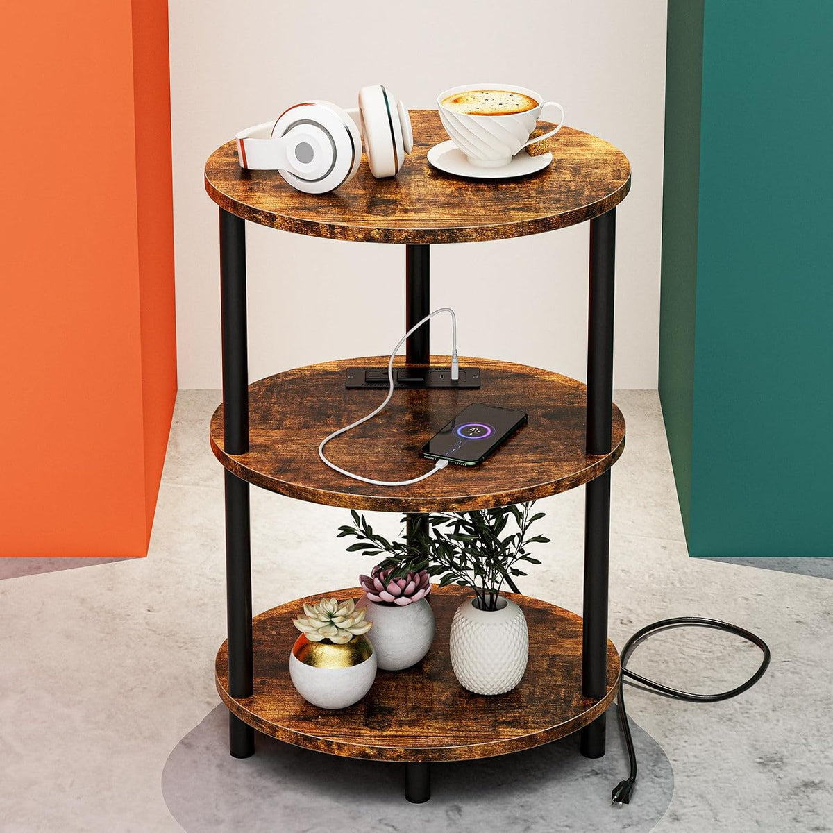 Single three-tier round table in distressed brown showing top cup, charging phone and potted succulents