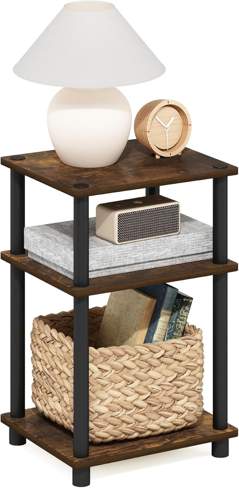 Dark wood three-tier side table styled with a lamp, clock, speaker and woven basket.
