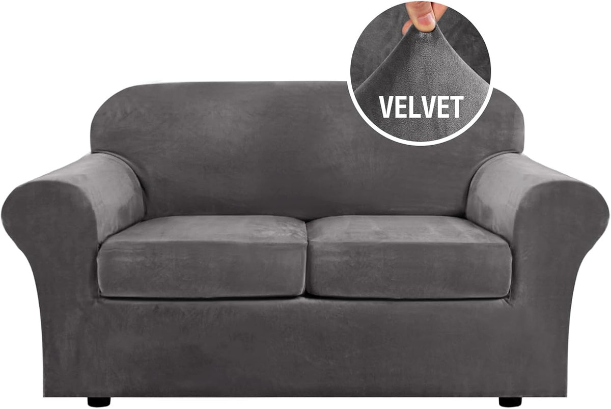 Front-facing gray two-cushion sofa (loveseat) with a round inset showing a hand pinching the velvet fabric.
