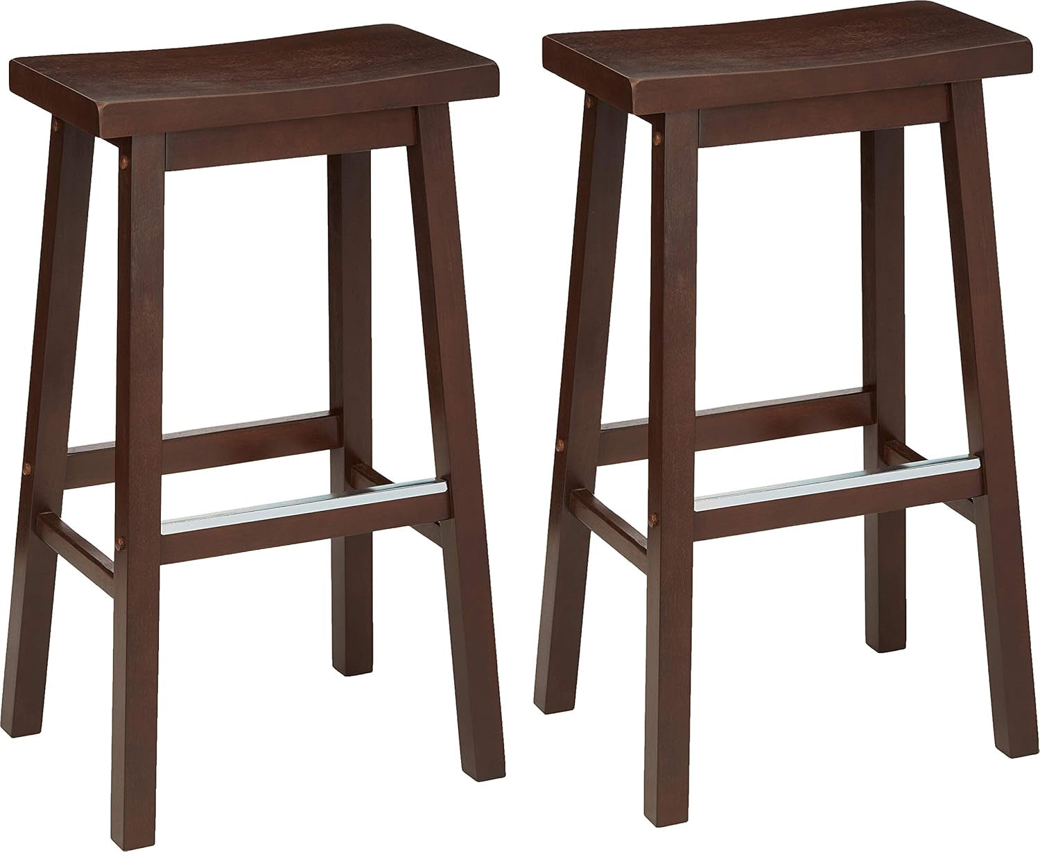 Pair of dark brown wooden saddle-seat counter stools with angled legs and metal footrest