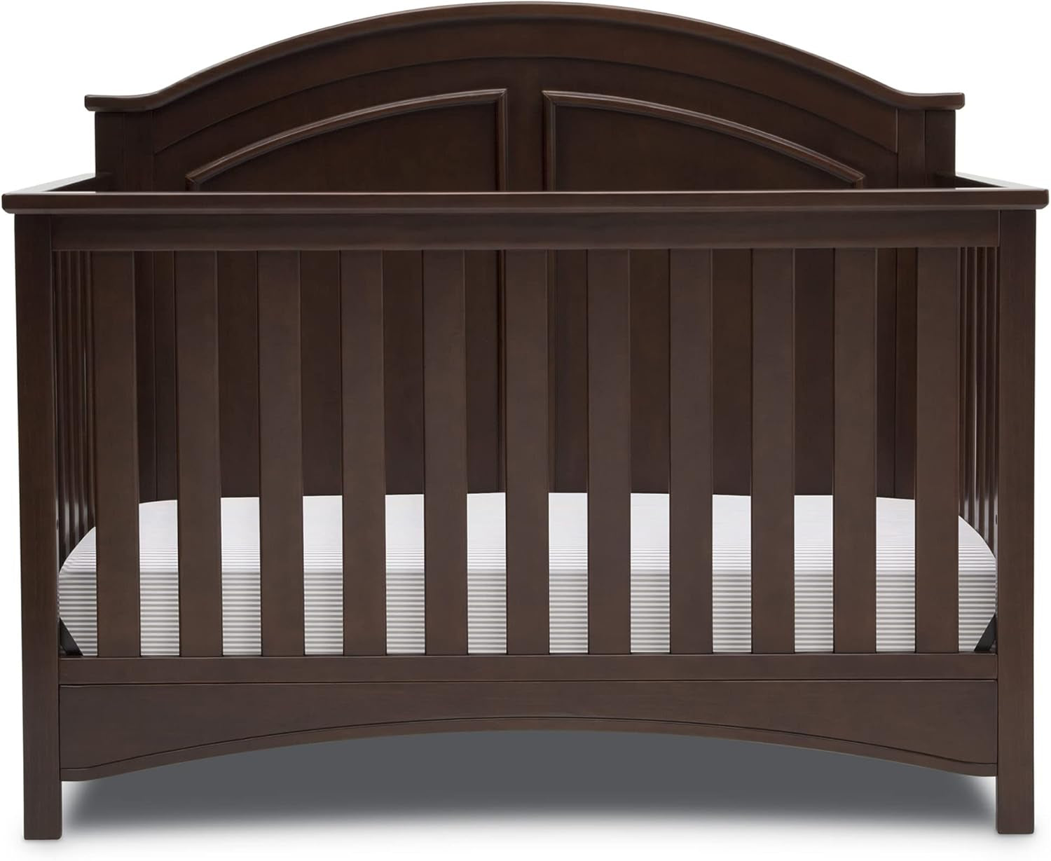 Front view of a dark brown wooden crib with curved headboard and evenly spaced slats.