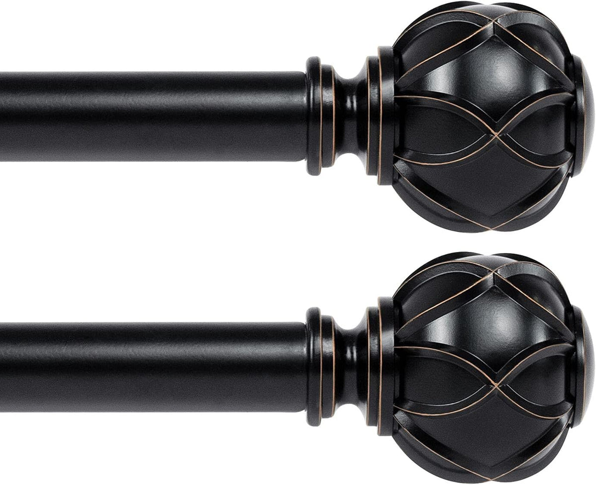 Two black curtain rods shown horizontally with matching ornamental spherical finials