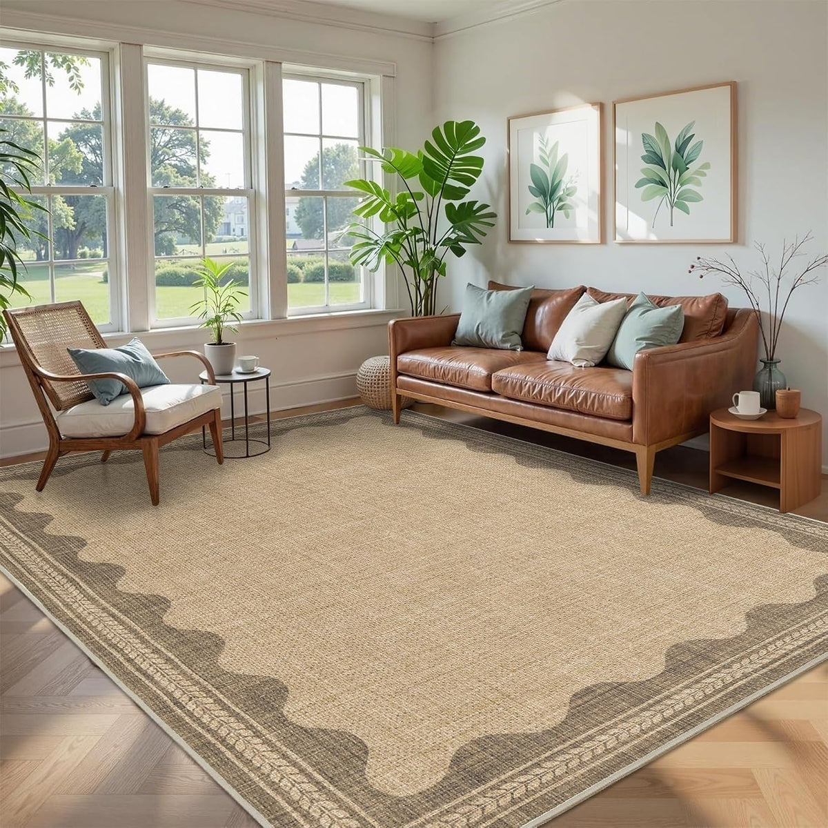 Sunlit living room with a woven neutral rug bordered by a scalloped darker edge.