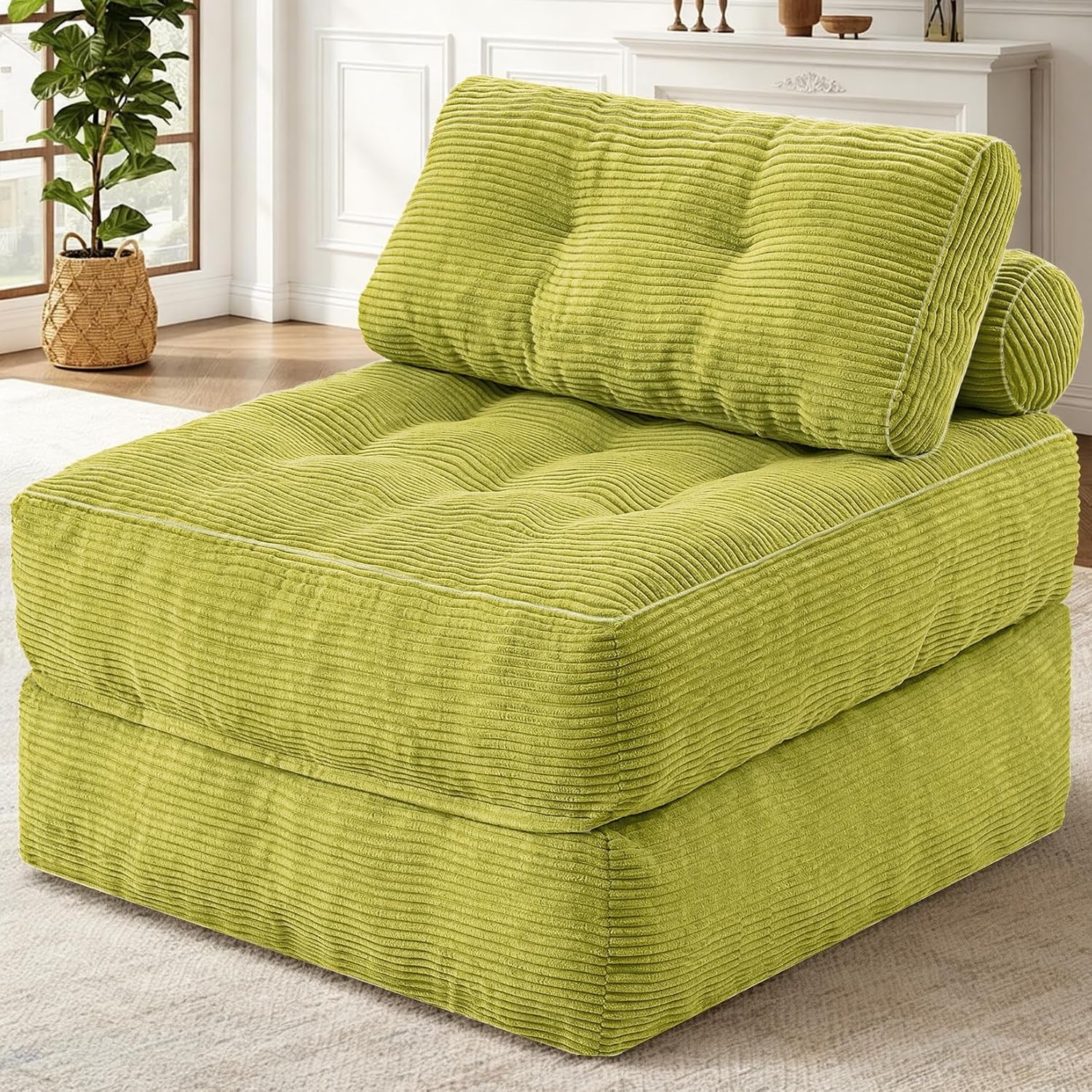 Three-quarter view of a single corduroy foldable sofa chair in bright green in a living room.