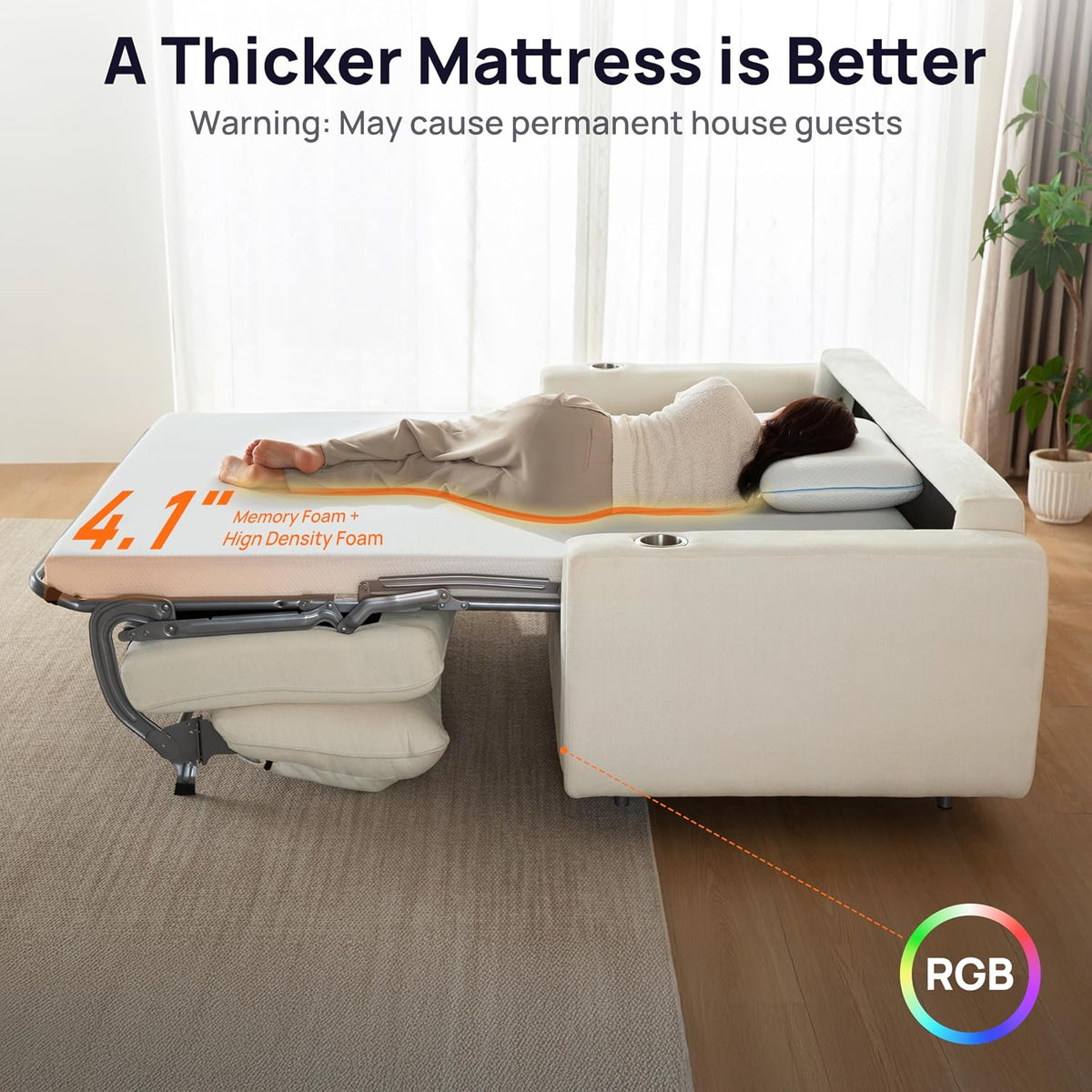 Side profile of the white sofa bed pulled out with a person lying on the mattress, armrest cup holder visible.