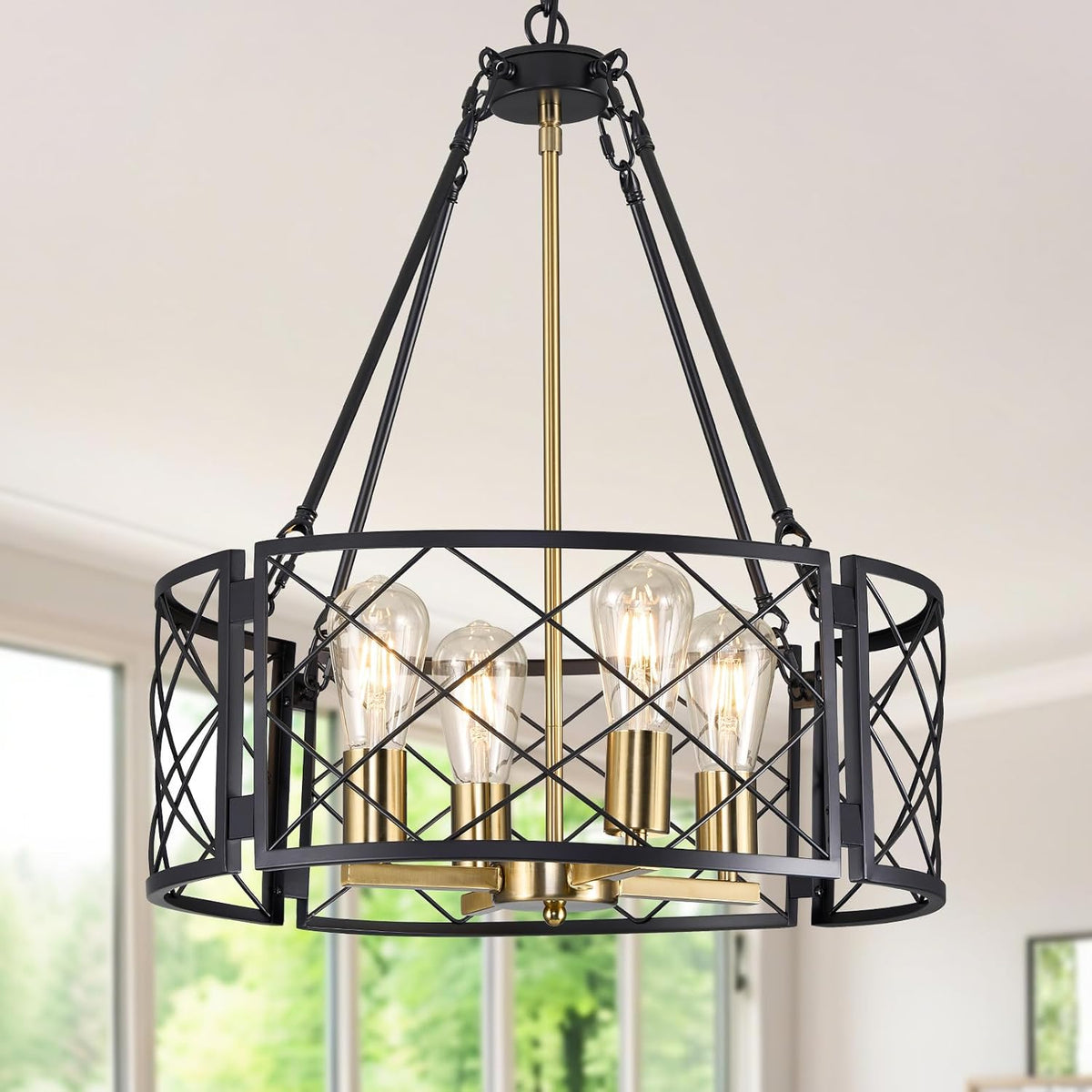 Angled view of the black geometric cage with gold inner stems and exposed vintage-style bulbs.